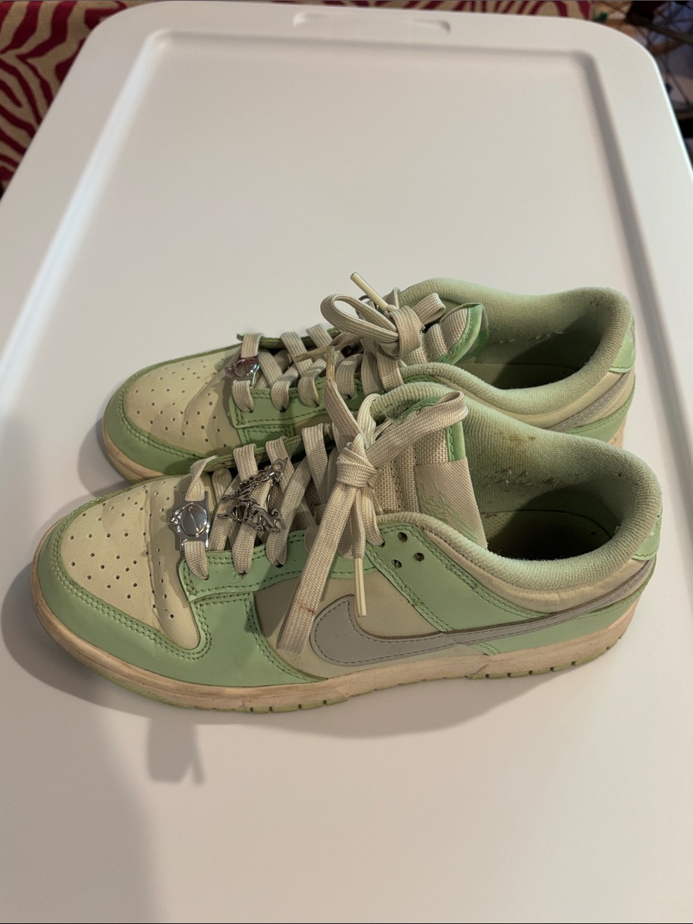 Nike Low-Top Sneakers in Light Green and Cream with Silver Swoosh